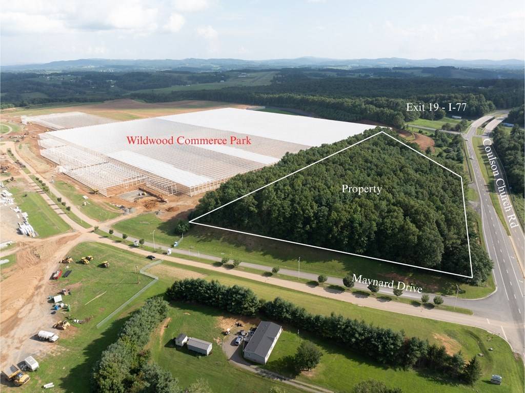 Annotated aerial from the north side with the parcel outlined,